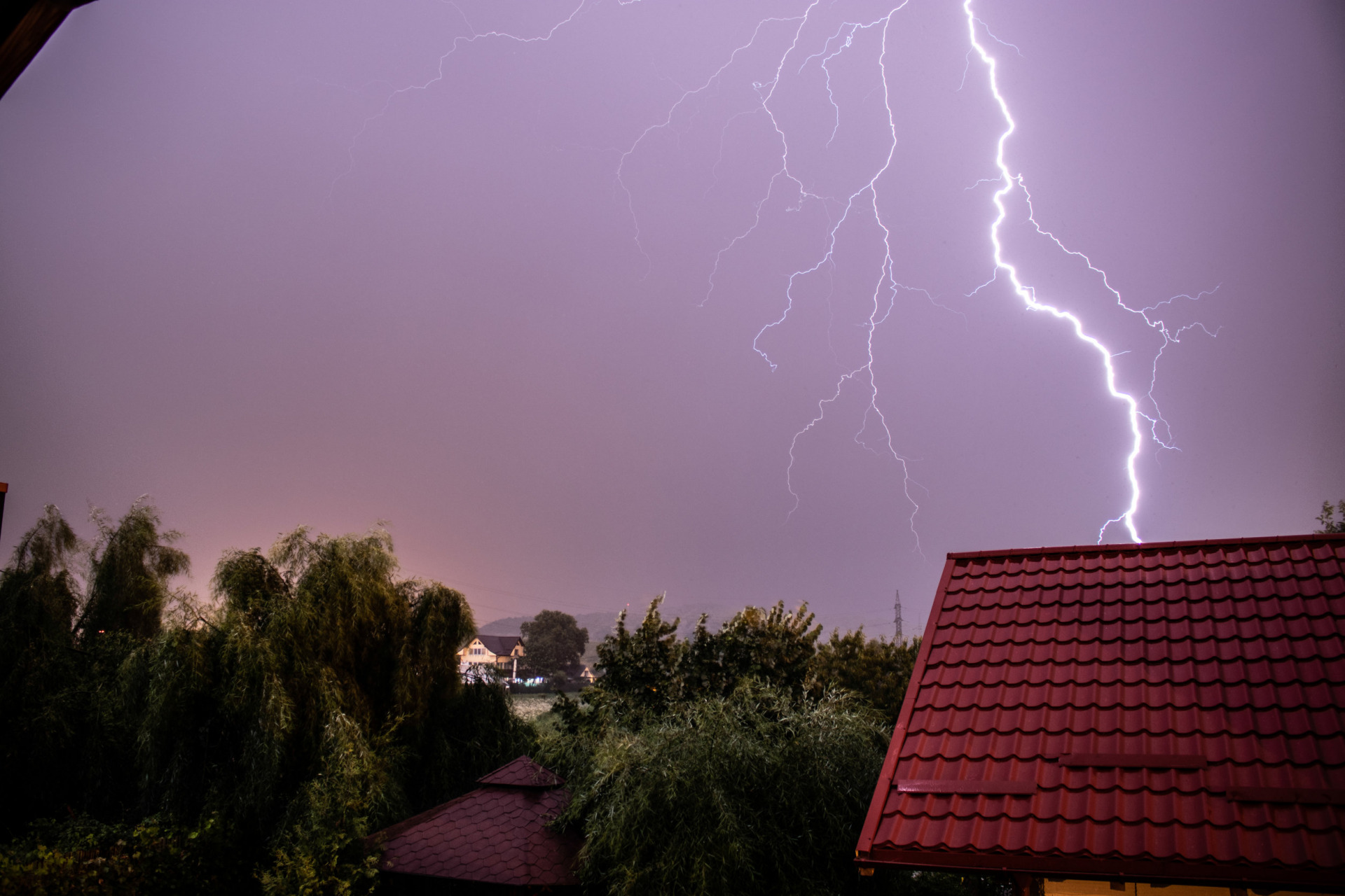 Lightning strike above a house - Roofing Company Baltimore County MD - Home Crafters Roofing and Contracting