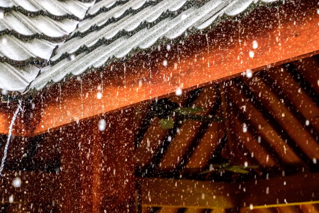 Hail against a metal roof - roofing contractor in baltimore county md - Home Crafters Roofing & Contractors